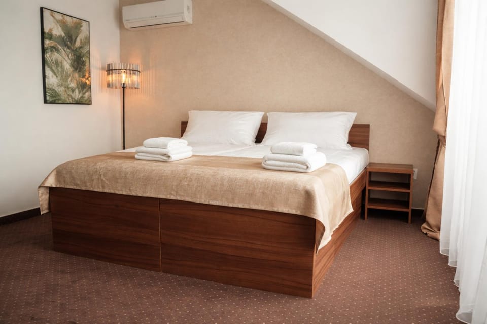 Photo of the whole room, Bedroom, towels, air conditioner