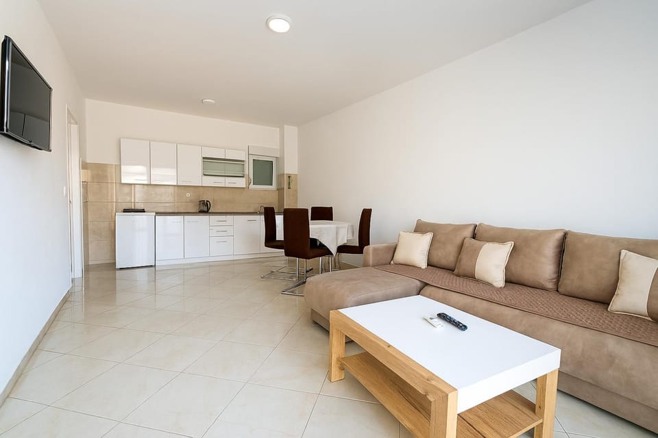 Living room, Seating area, storage, kitchen
