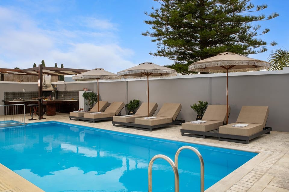 Patio, Day, Seating area, Pool view, Swimming pool, sunbed