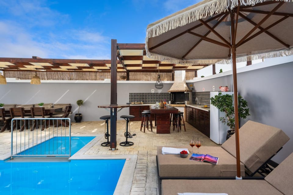 Patio, Day, Pool view, Swimming pool, sunbed