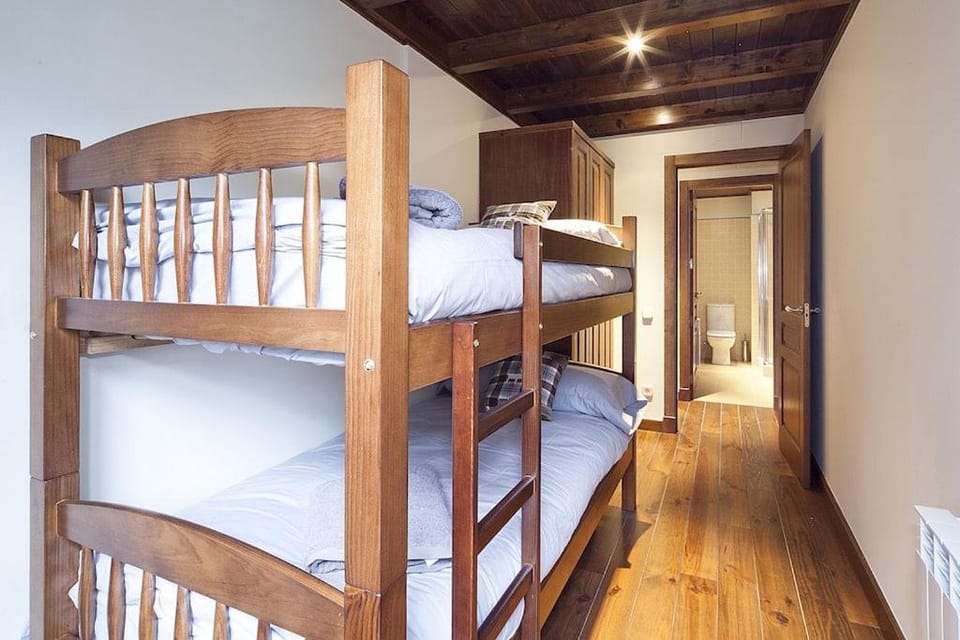 Bed, Photo of the whole room, Bedroom, bunk bed, towels, wardrobe