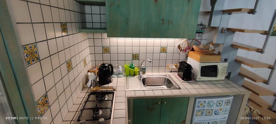 Kitchen or kitchenette, stove