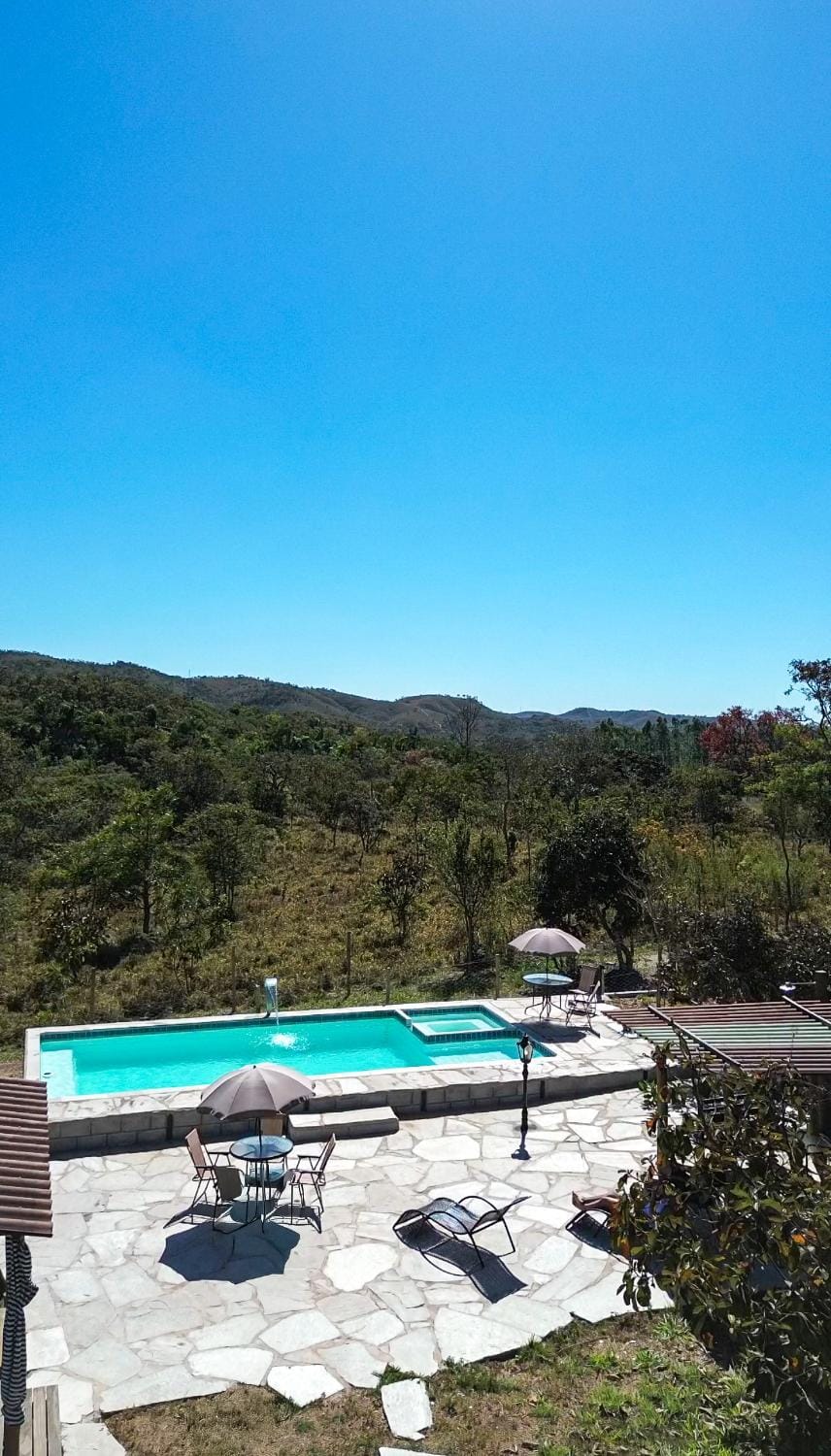 Chalé aconchegante, pertinho da cidade e conectada a natureza House in State of Goiás