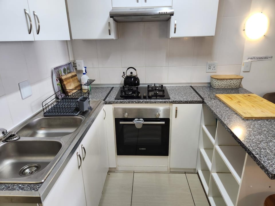 Kitchen or kitchenette, oven, stove