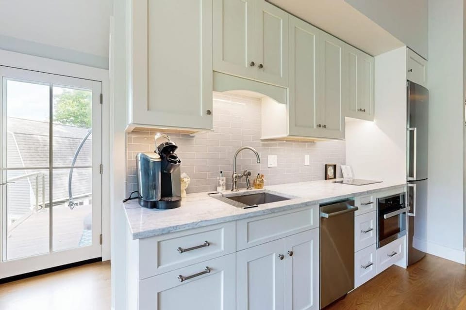 Kitchen or kitchenette, dishwasher, stove, toaster, kitchen