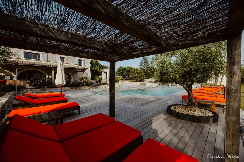 Property building, Patio, Natural landscape, Swimming pool, sunbed