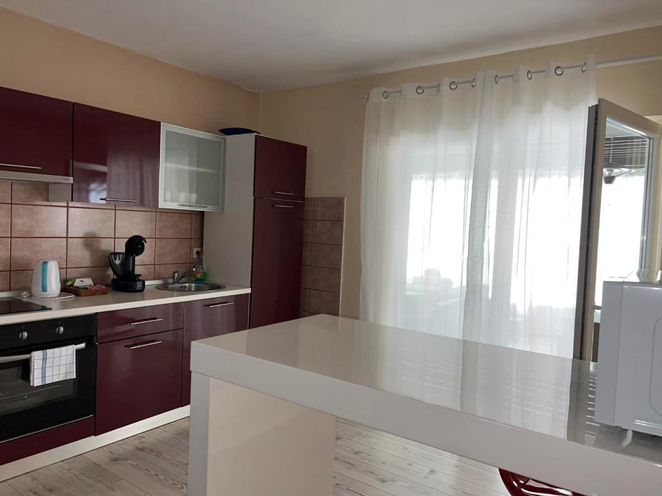 Kitchen or kitchenette, oven, stove