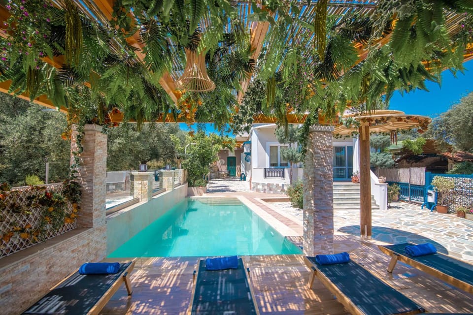 Patio, Day, Natural landscape, Pool view, Swimming pool, sunbed