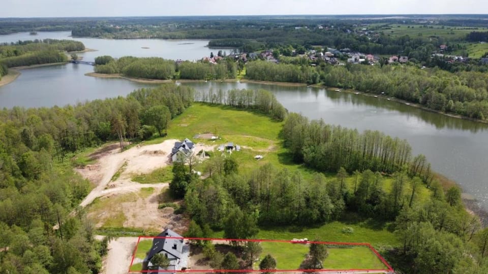 Domek ZOZO nad jeziorem w Okuniowcu House in Lithuania