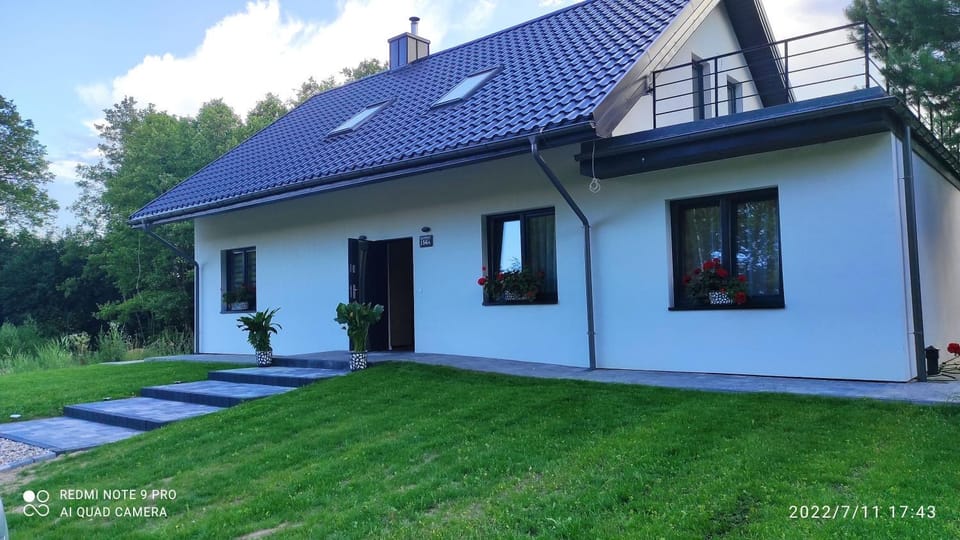 Domek ZOZO nad jeziorem w Okuniowcu House in Lithuania