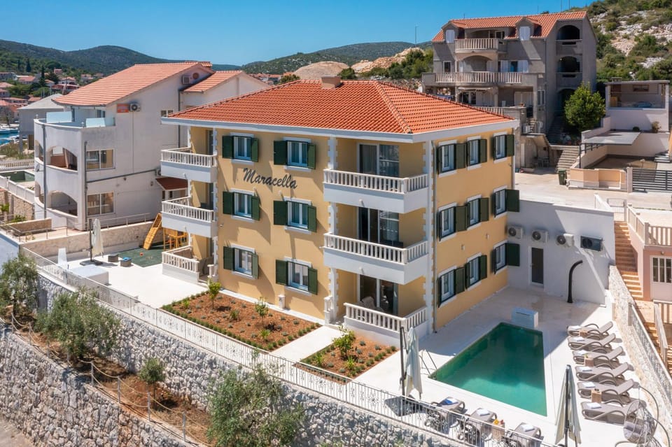 Property building, Pool view, Swimming pool, sunbed