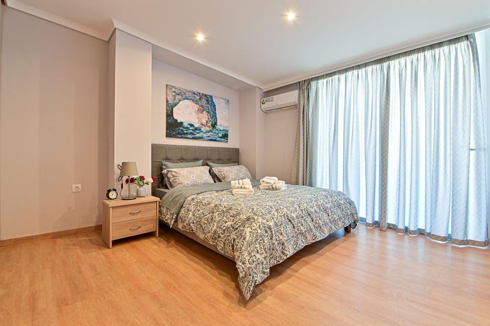 Bed, Photo of the whole room, Bedroom, towels, air conditioner