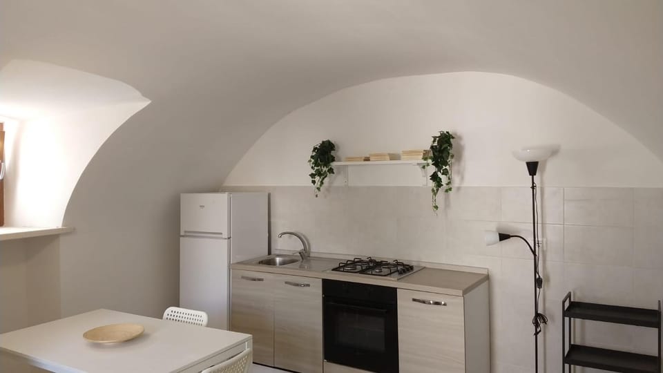 Kitchen or kitchenette, oven, stove