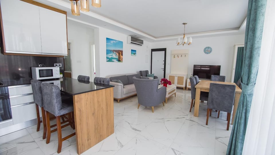 Kitchen or kitchenette, Living room, Seating area, Dining area