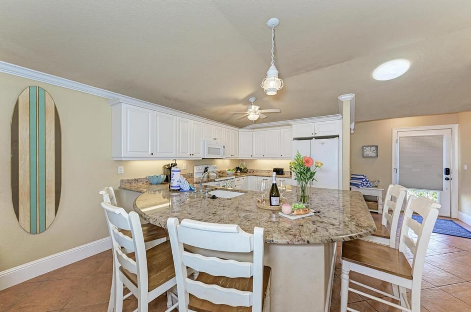 Sand Dollar: Poolside Condo 2 Blocks to Beach by Anna Maria Life Vacation Rentals House in Holmes Beach