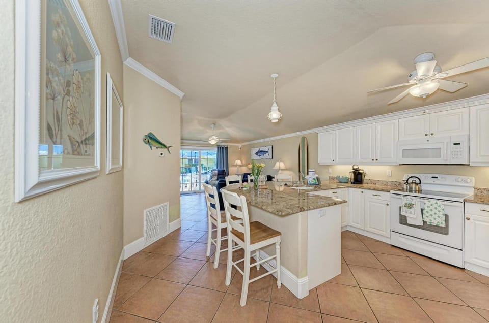 Sand Dollar: Poolside Condo 2 Blocks to Beach by Anna Maria Life Vacation Rentals House in Holmes Beach