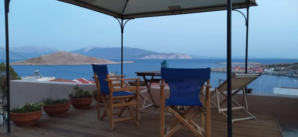 Patio, Day, Natural landscape, View (from property/room), Seating area, Dining area, Sea view
