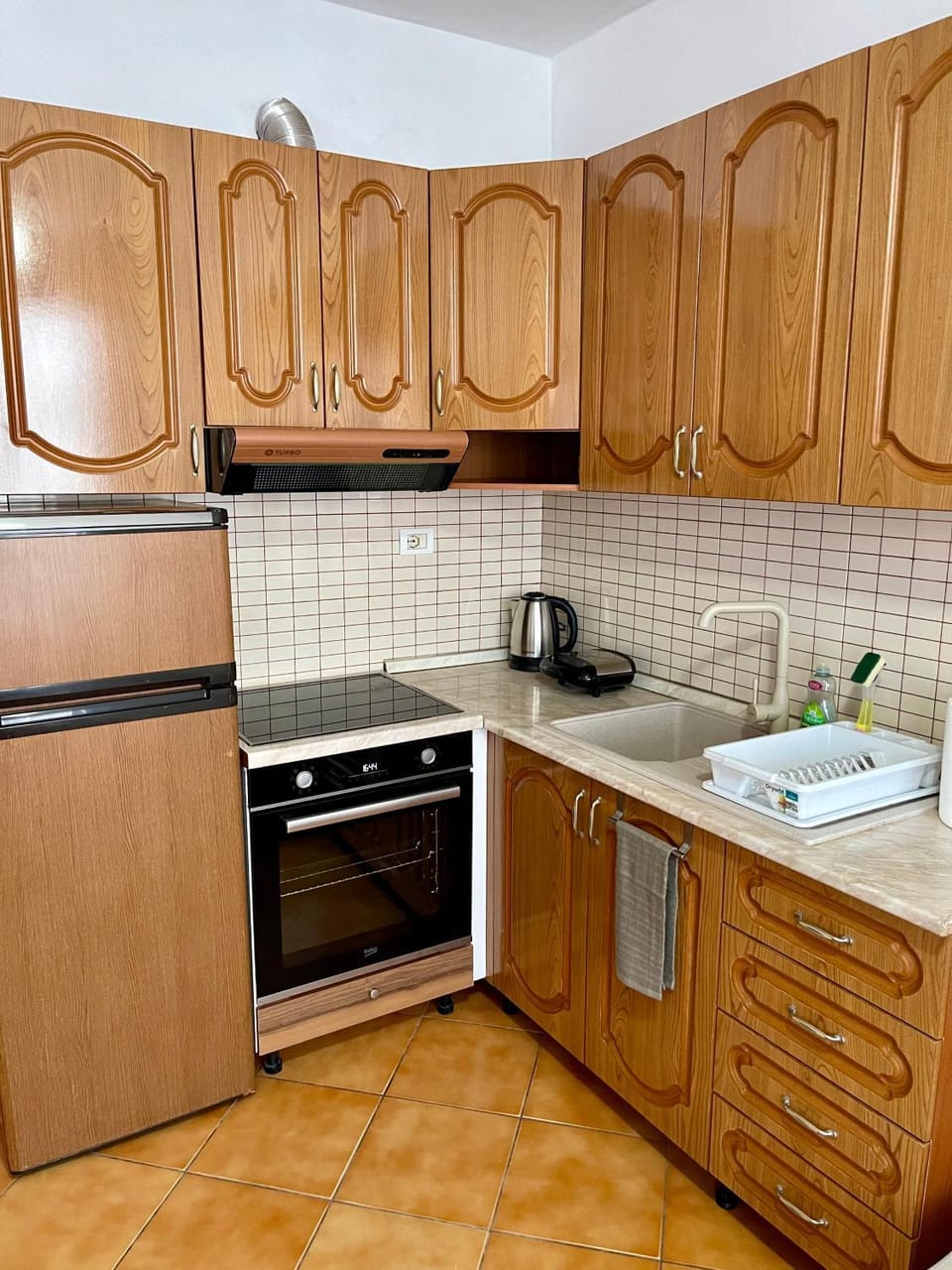 Kitchen or kitchenette, oven