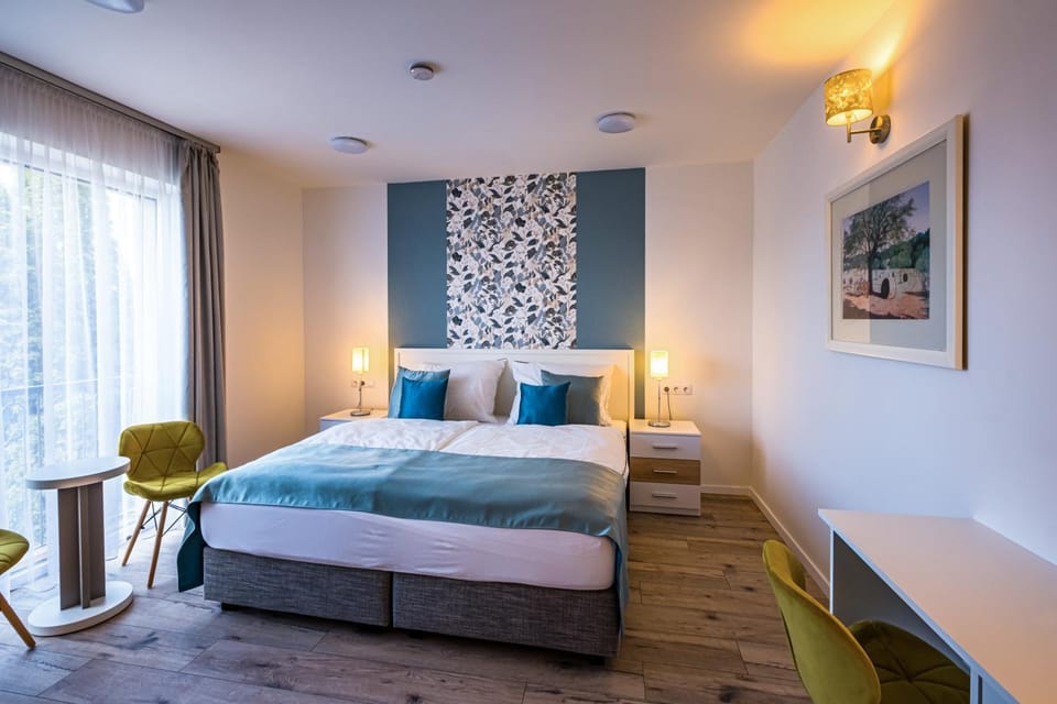 Bed, Living room, Seating area, Bedroom