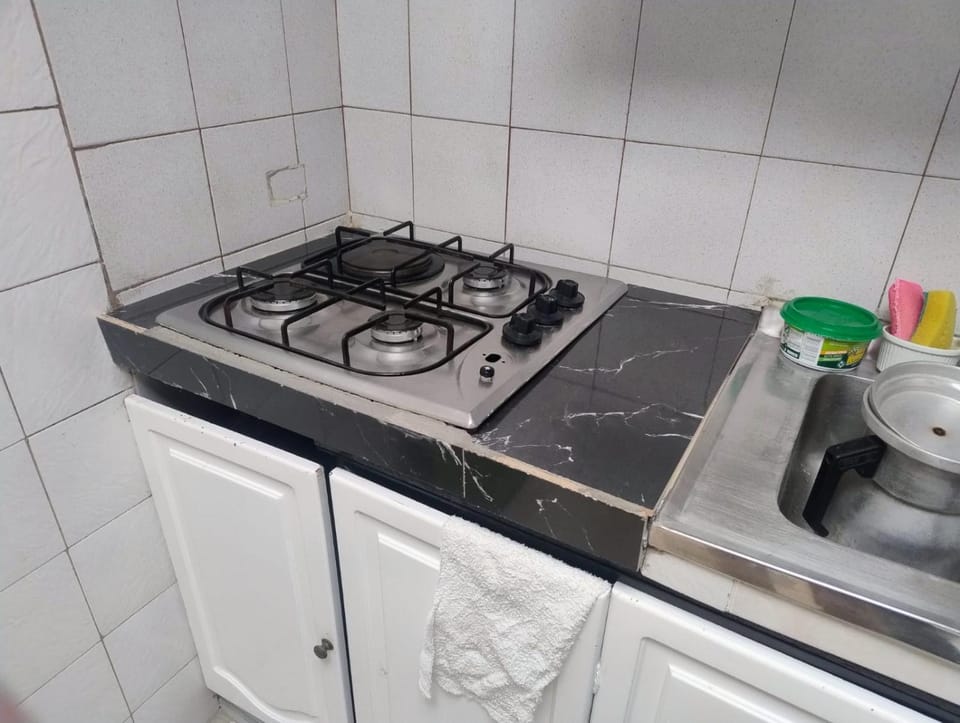 Kitchen or kitchenette, stove