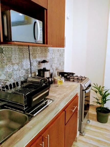 Kitchen or kitchenette, stove