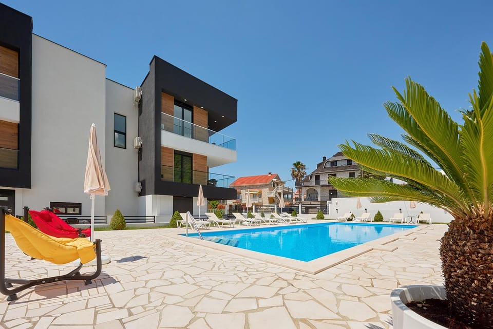 Property building, Patio, Swimming pool