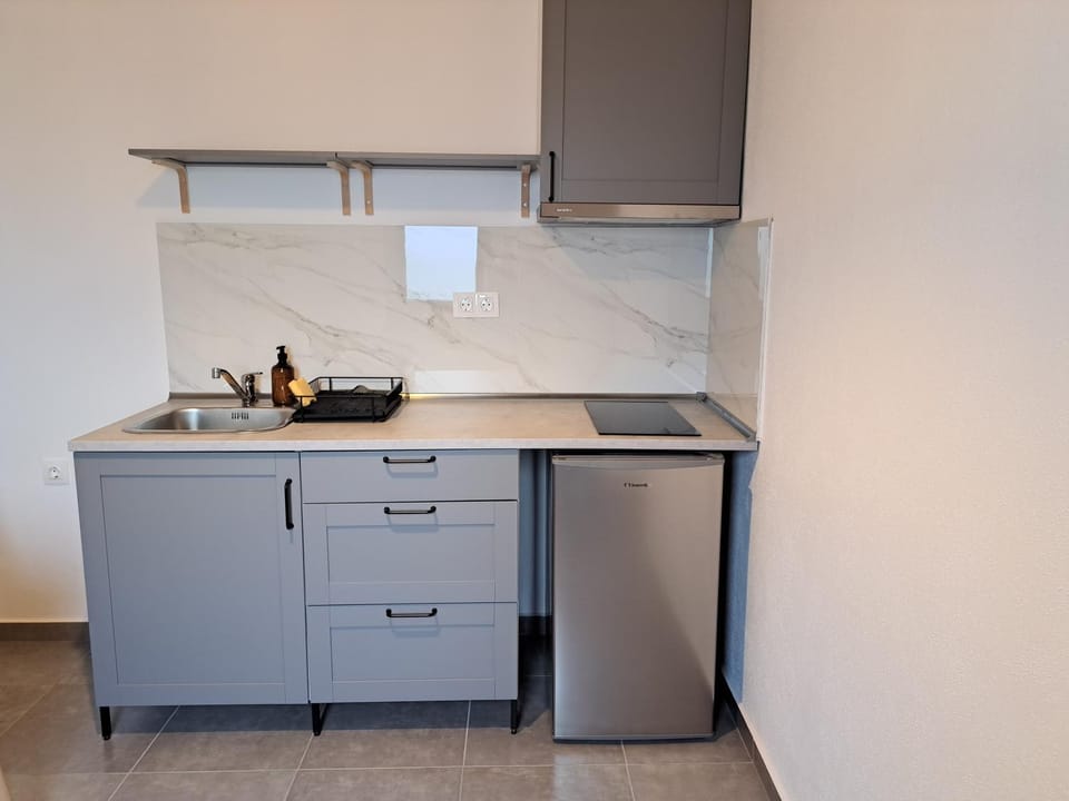Kitchen or kitchenette, stove