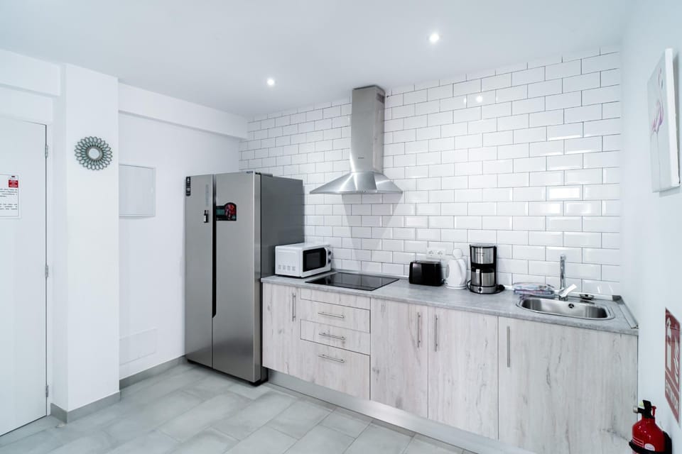 Kitchen or kitchenette, stove, toaster