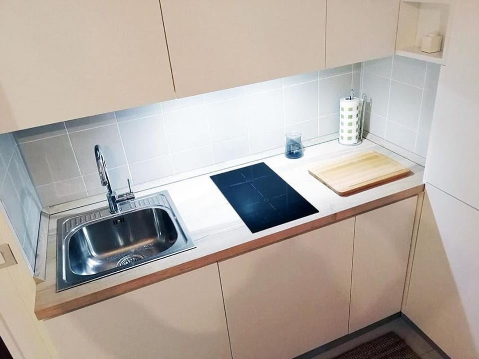 Kitchen or kitchenette, stove