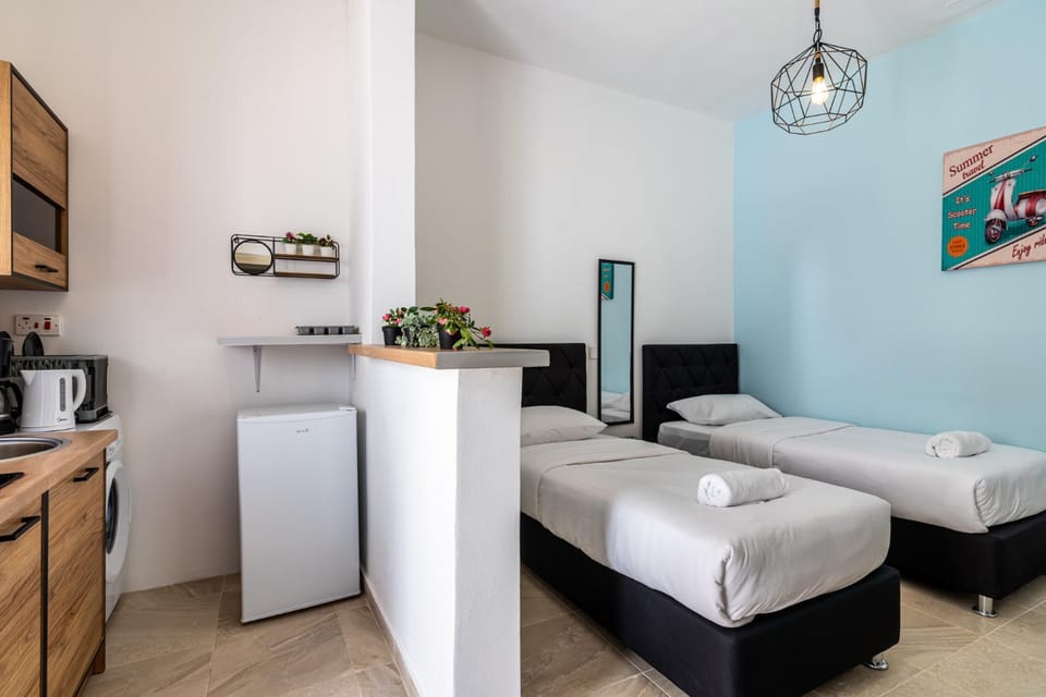 Bed, Kitchen or kitchenette, towels