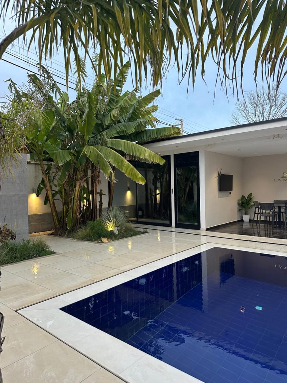 Property building, Patio, Day, Pool view, Swimming pool, sunbed
