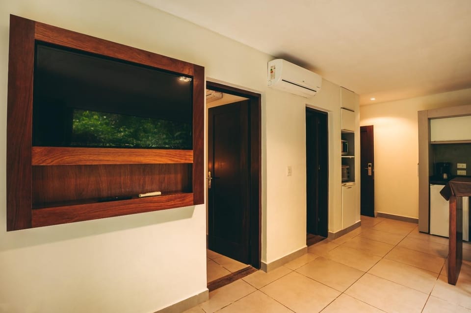 TV and multimedia, Kitchen or kitchenette, wardrobe, air conditioner