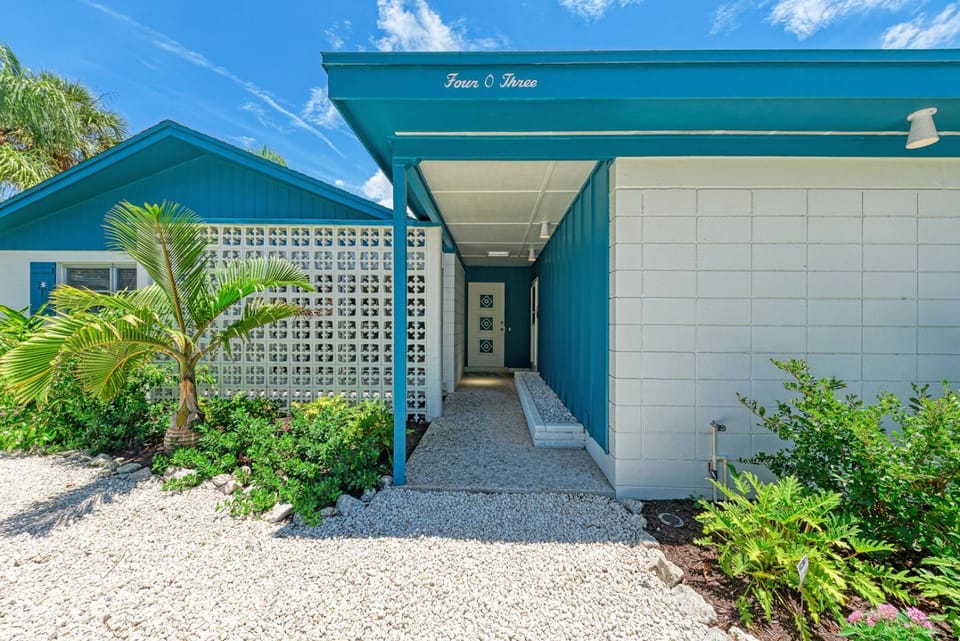 One Day More: Spectacular Oasis Backyard with Pool & Spa by Anna Maria Life Vacation Rentals House in Holmes Beach