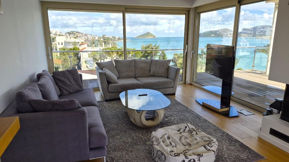 View (from property/room), Living room, Seating area, Sea view