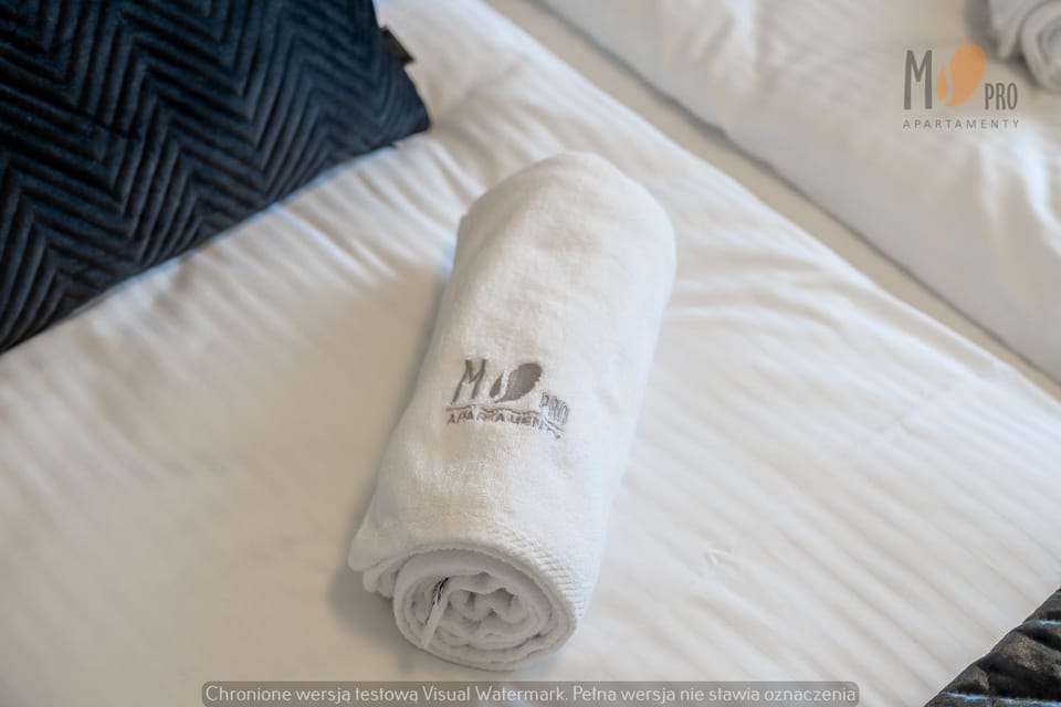 Bed, Property logo or sign, Bedroom