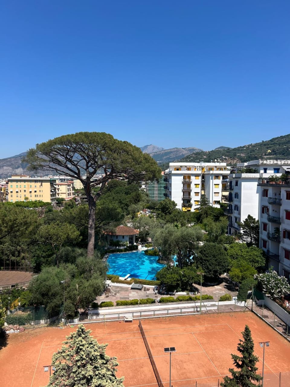 Property building, Nearby landmark, Day, Natural landscape, Bird's eye view, Pool view, Swimming pool
