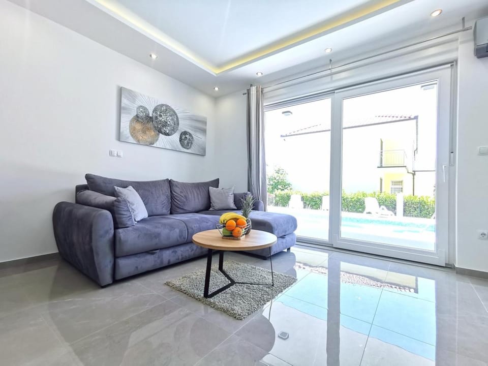 Living room, Seating area, Pool view, Swimming pool
