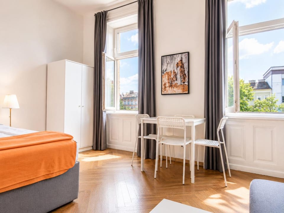 Bed, Seating area, Dining area, Bedroom