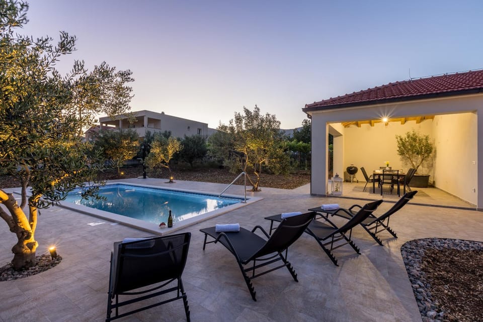 Patio, BBQ facilities, Seating area, Swimming pool, Sunrise, Sunset