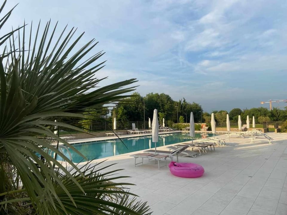 Property building, Living room, Swimming pool