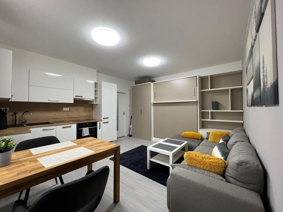 Kitchen or kitchenette, Living room, Seating area, Dining area