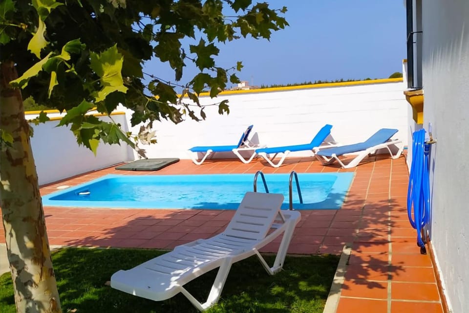 Property building, Living room, Swimming pool