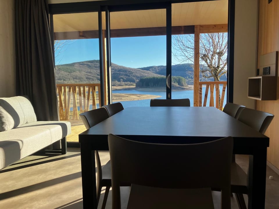 Living room, Seating area, Dining area, Garden view, Lake view, Mountain view