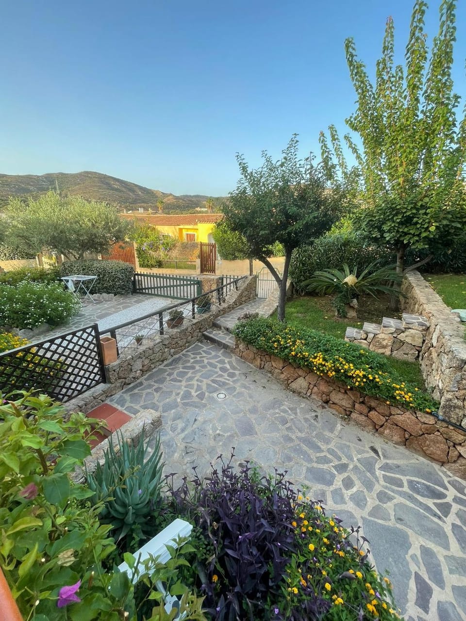 Casa Souad, a cheerful and charming beach view 2 bedroom house and free parking House in Sardinia
