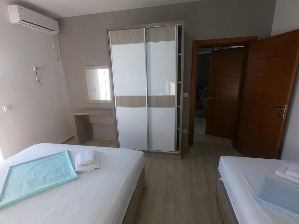 Bed, Photo of the whole room, Bedroom, towels, air conditioner