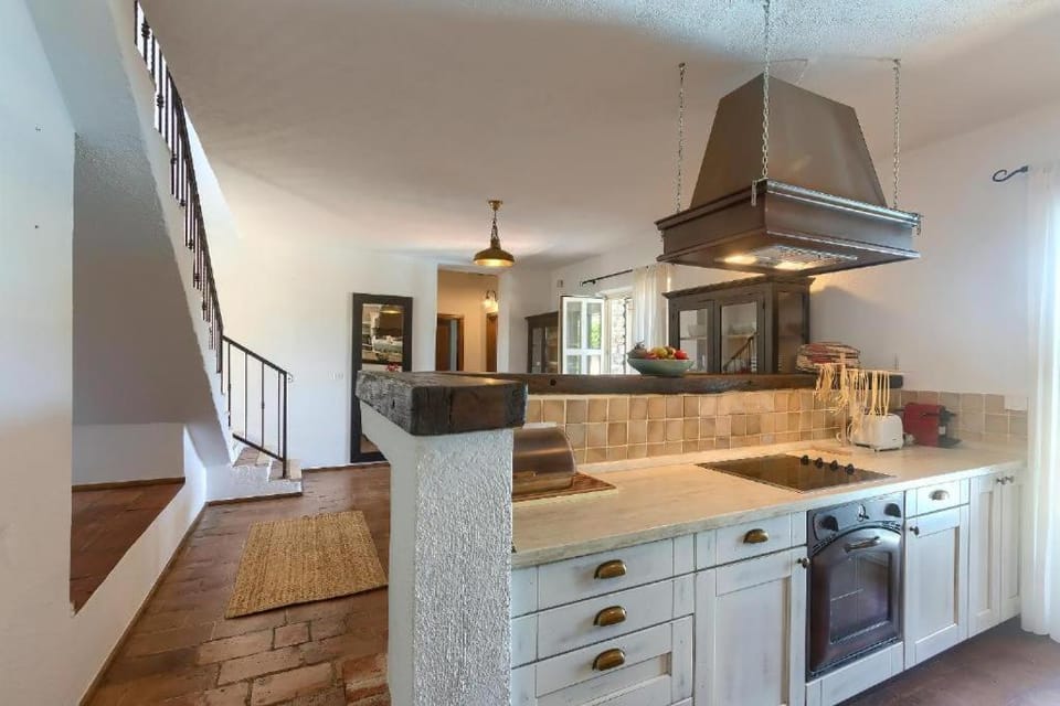 Kitchen or kitchenette, stove, toaster