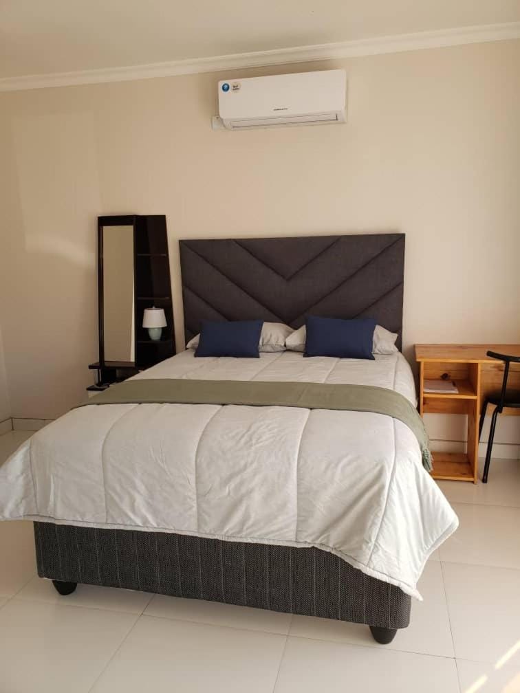 Bed, air conditioner