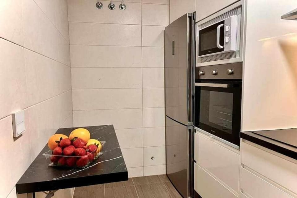 Kitchen or kitchenette, oven, stove