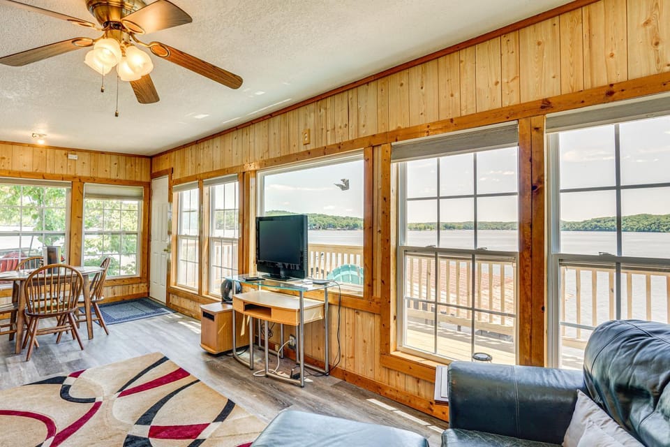 Deck with Covered Dock! Lakefront Ozark Cottage Apartment in Lake of the Ozarks
