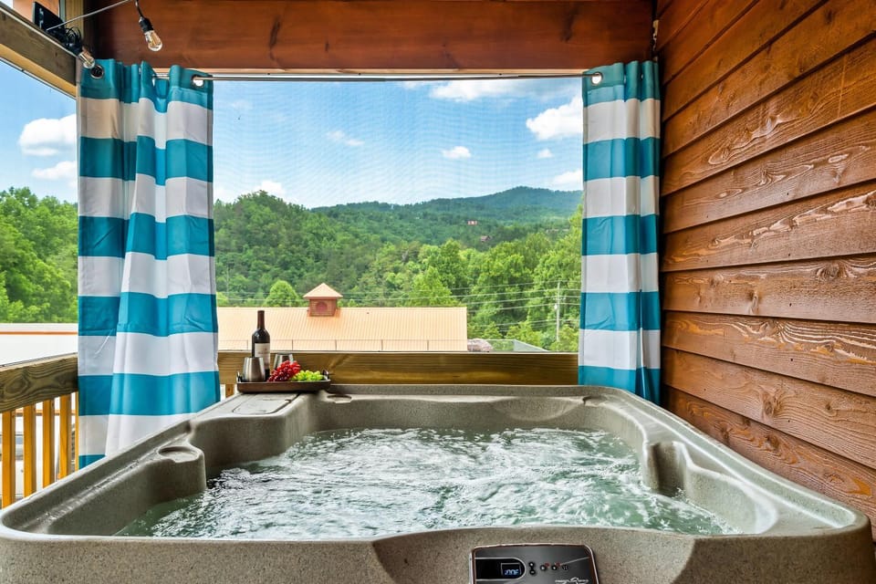 SmokiesBoutiqueCabins would love to host you at Dolly's Cute Cabin! 4 Suites with Private Bathrooms - Hot Tub, Fire Pit, Game Room, Resort Pool open Memorial Day through Labor Day! Cabin in Pittman Center